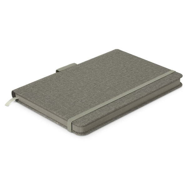 A Meridian Notebook with a textured green cover and a matching elastic band for closure.