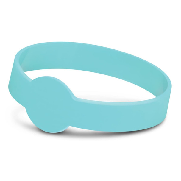 A turquoise silicone wristband with a circular feature, designed for glow in the dark effects.