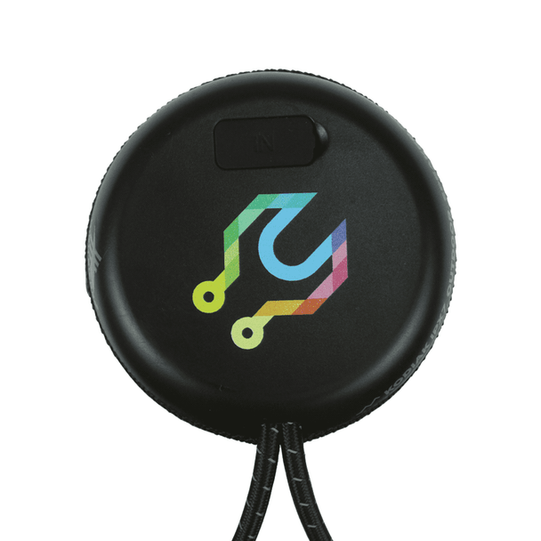 A round black Bluetooth speaker with a multicoloured logo, featuring a textured surface and a loop for attachment.