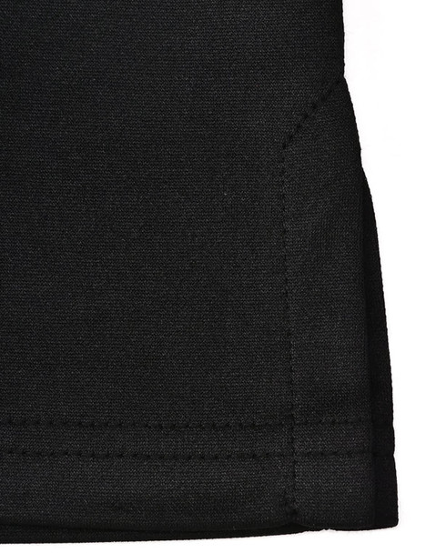 A close-up of a black sustainable poly/cotton polo shirt, featuring a neatly finished hem and a tag on the fabric. A close-up of a black sustainable poly/cotton polo shirt, featuring a neatly finished hem and a tag on the fabric.