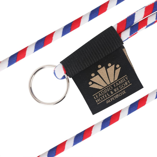 A red, white, and blue poly rope lanyard with a black attachment and a ring for holding items.