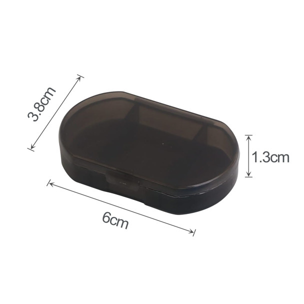 A black pill box with three compartments, measuring 6 cm by 3.8 cm by 1.3 cm. It features a secure closure.