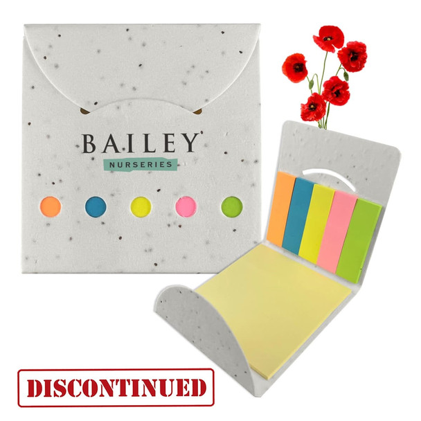 A sticky note pad in pastel colours with a speckled design and a floral decoration of red corn poppies.