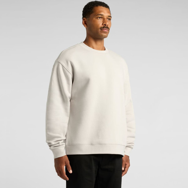 A plain light grey sweater with a relaxed fit, featuring a logo on the front.