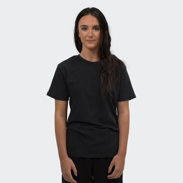 A black unisex T-shirt displayed on a model, featuring a simple design and a relaxed fit.