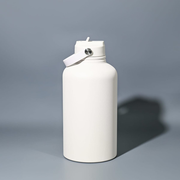 A drink bottle in a matte white finish with a screw top and a handle. It has a logo on the body. A drink bottle in a matte white finish with a screw top and a handle. It has a logo on the body.
