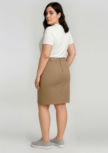 A mid-waist stretch chino skirt in a tan colour, paired with a white short-sleeve top. Features a rear view with a logo.