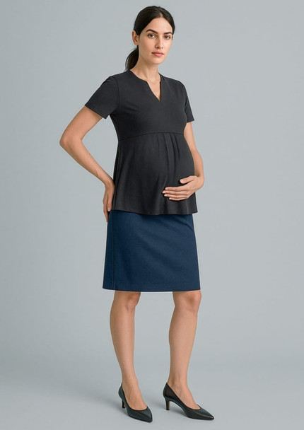 A maternity skirt in navy blue paired with a black top, displayed on a model with a baby bump.