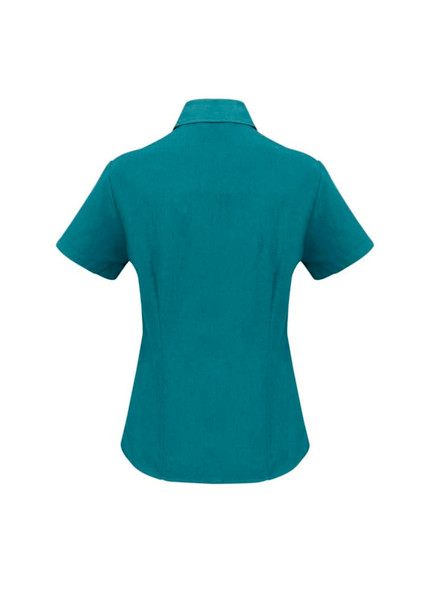 A plain short sleeve button-up shirt in teal, featuring a collared neck and a logo on the back.