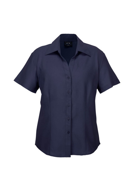 A short-sleeve, button-up women's shirt in navy blue, featuring a sleek design and a logo on the label.