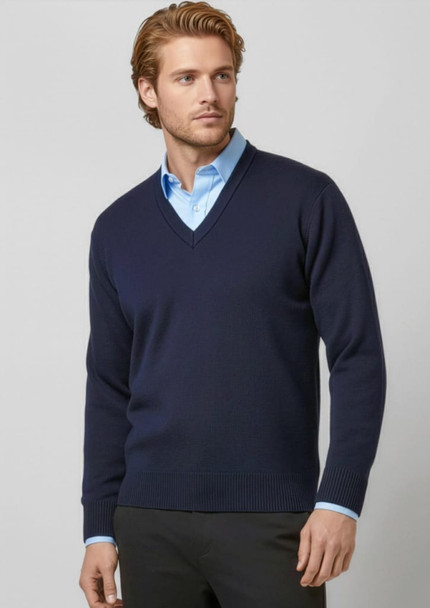 A navy blue woolmix knit pullover with a v-neck design, featuring a model wearing it over a light blue shirt.