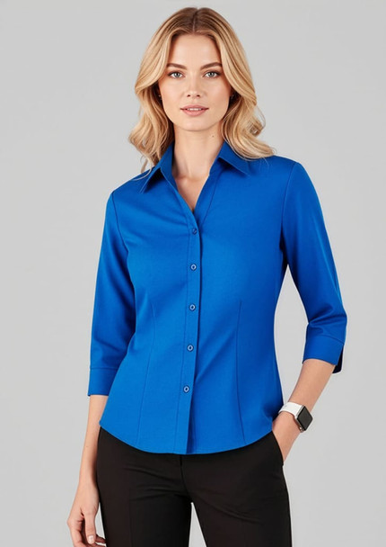 A blue 3/4 sleeve shirt worn by a model, featuring a collar and button-up front, with a subtle logo present.