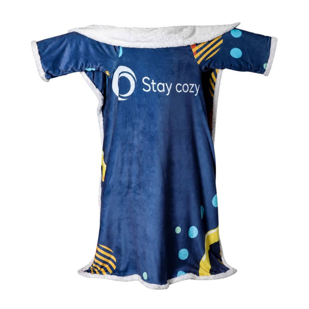 A blue and patterned wearable blanket with a soft, white lining and a logo is displayed.