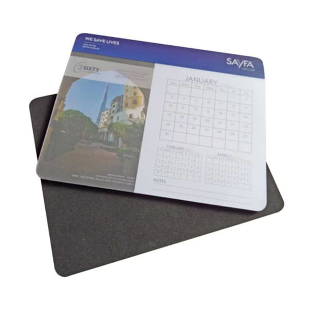 A calendar mouse mat featuring a glossy top with a calendar layout and a dark, textured backing.