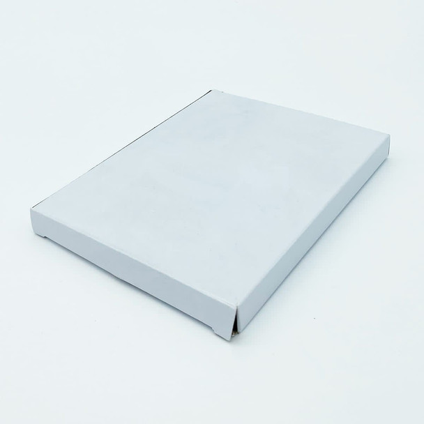 A white rectangular box with a flat lid, featuring a clean, minimalist design. A white rectangular box with a flat lid, featuring a clean, minimalist design.