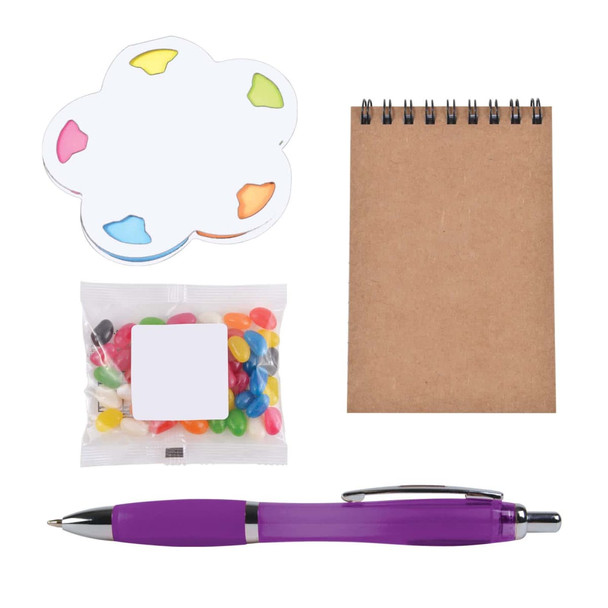 A purple pen, a notepad, a colorful sticky note set, and a packet of jelly beans in various colors.