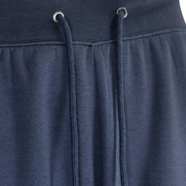 Navy blue unisex sweatpants featuring an elastic waistband with drawstrings and metal eyelets. Includes a logo.