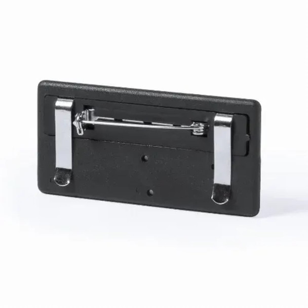 A black badge holder with a metal pin and clips on the back for attachment.
