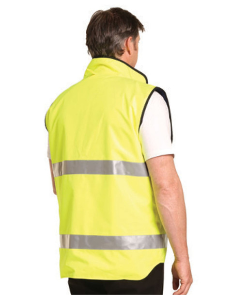 A reversible safety vest in high-visibility yellow with 3M reflective tape, featuring a mandarine collar and no logo visible.