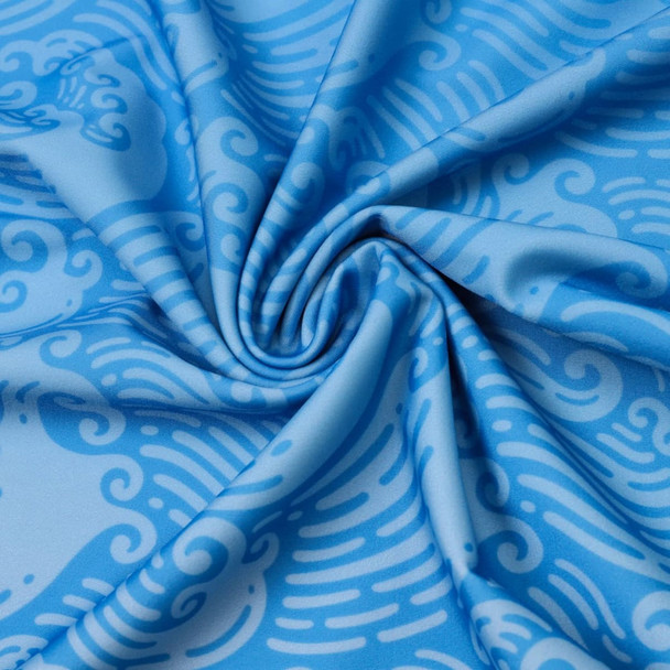 A blue patterned fabric featuring swirling designs, suitable for a sublimation rashie.