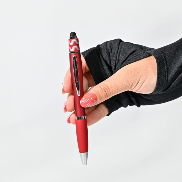 A red Spinner Fidget Pen held in a hand with a patterned nail polish, featuring a stylus tip.