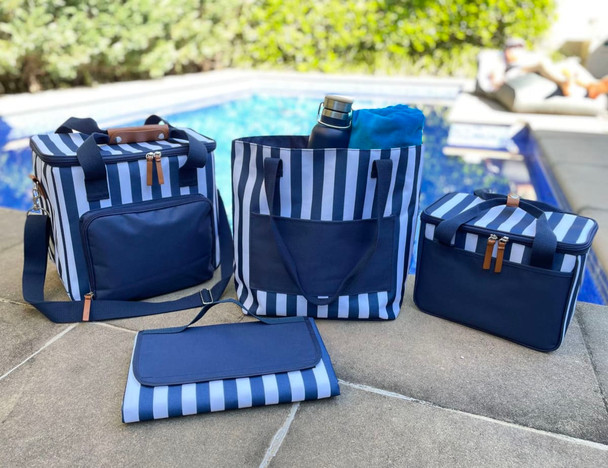 A range of navy striped cooler bags, including a large bag, a medium bag, a small bag, and a foldable item.