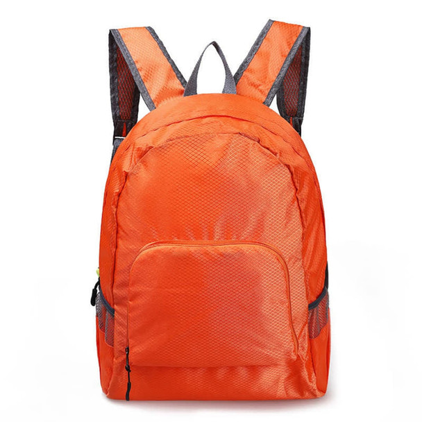 An orange backpack with a front pocket and padded shoulder straps, featuring a logo on the side.