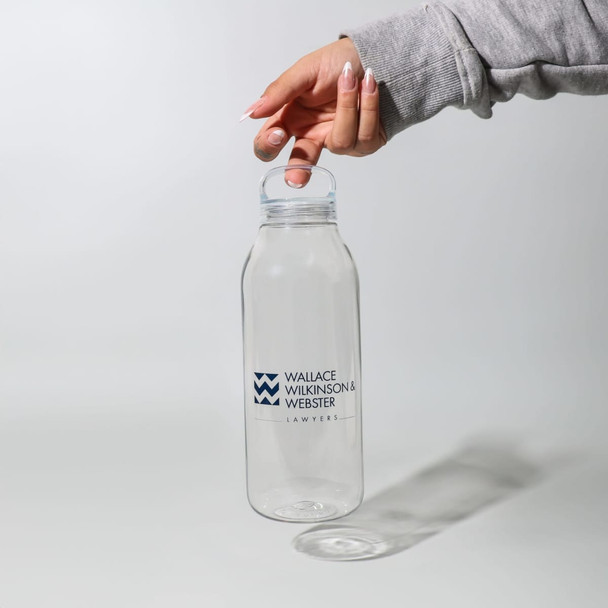 A drink bottle with a clear design and a lid, featuring a logo in blue on the front.