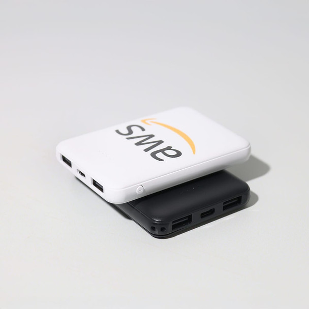 A white and black powerbank stacked together, featuring a logo and multiple USB ports. A white and black powerbank stacked together, featuring a logo and multiple USB ports.
