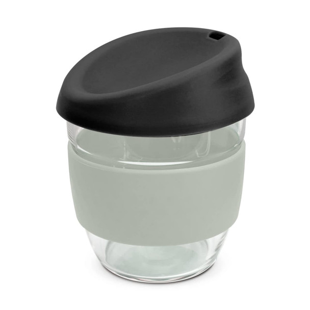 A drink bottle made of clear borosilicate glass with a black lid and grey silicone sleeve. Features a logo.
