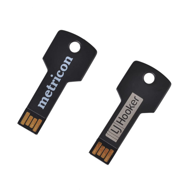 Two black square key flash drives are displayed, featuring metal connectors and distinct branding on each.