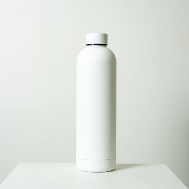 A drink bottle in white with a sleek, minimalist design and a simple logo.