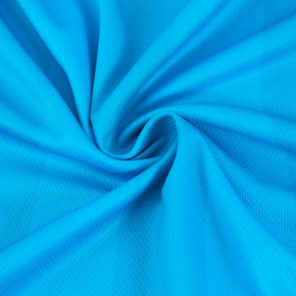 A close-up of a blue polyester fabric, showcasing a smooth texture with a spiral pattern. It has a subtle sheen.