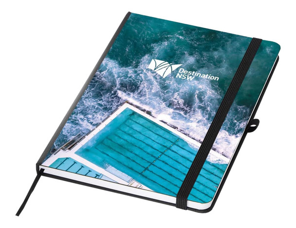 A notebook featuring a turquoise pool design on the cover, with a black spine and elastic band. It has a logo.