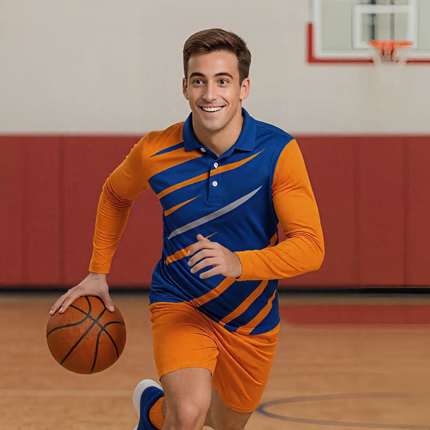 A man in a blue and orange long-sleeve polo shirt dribbles a basketball in a gym setting.