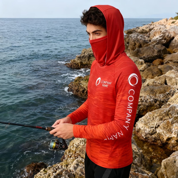 A red polyester spandex hoodie with a hood and face cover, displayed by a person fishing by the water's edge.