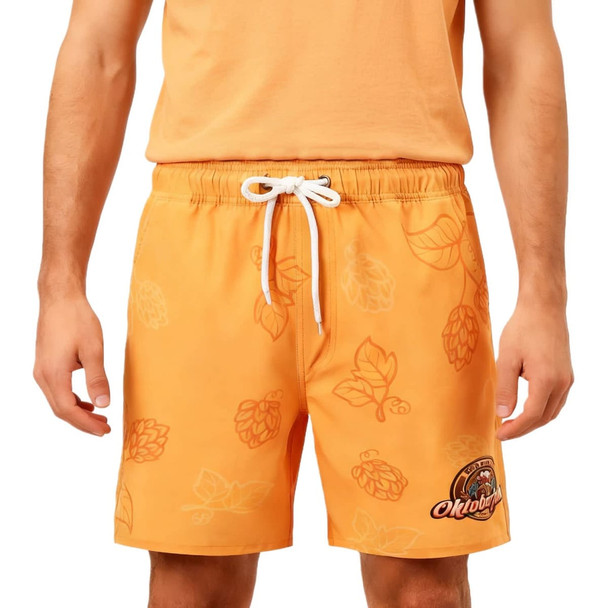 Men's orange polyester spandex swim shorts featuring a leaf pattern and a logo on the front.