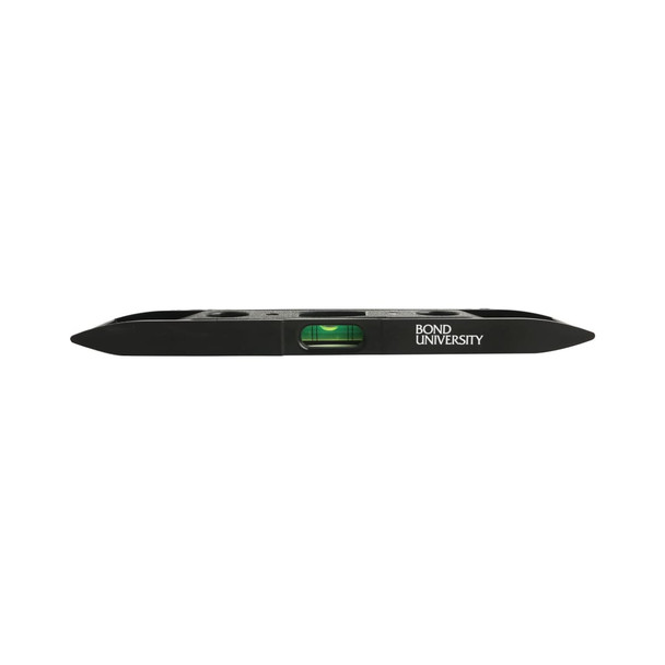 A magnetic torpedo level in black with a green bubble and a logo.