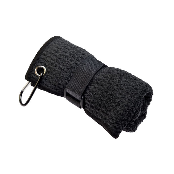 A folded black travel towel secured with a strap and carabiner, featuring a textured surface.