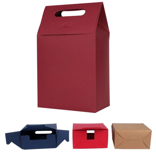 A red die cut handle bag stands upright, surrounded by blue, red, and brown boxes, featuring various box designs.