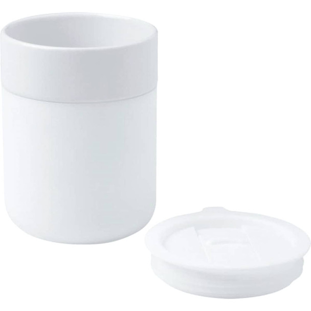 A drink bottle featuring a white ceramic tumbler with a silicone wrap and a matching lid.