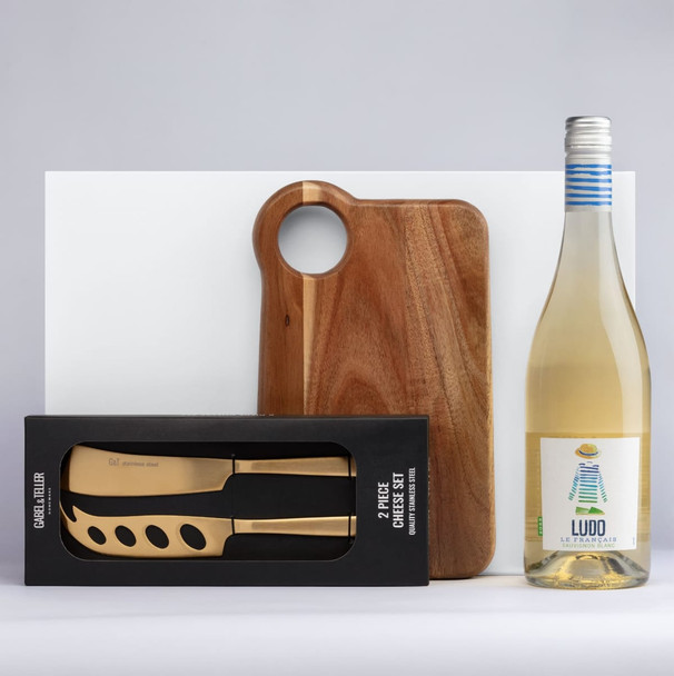 A drink bottle, a wooden cheese board, and a two-piece cheese knife set in a box, featuring gold-tone knives. A drink bottle, a wooden cheese board, and a two-piece cheese knife set in a box, featuring gold-tone knives.
