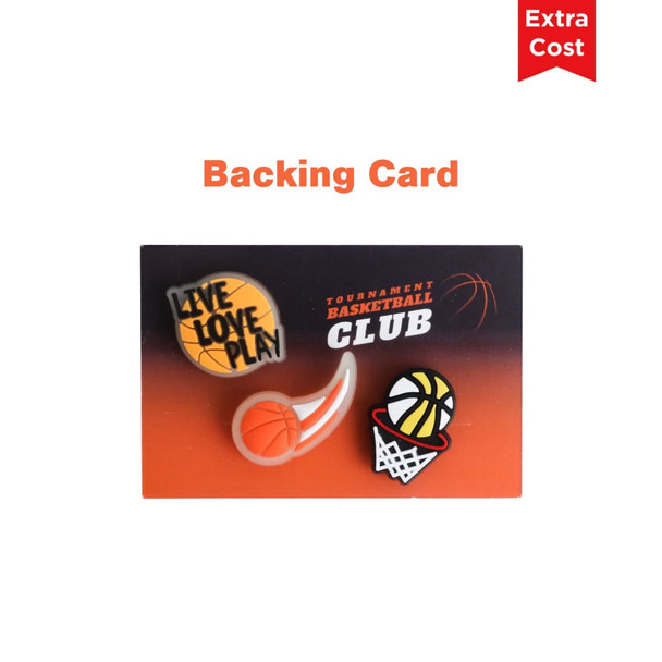 A backing card displaying four basketball-themed charms in orange and black, featuring a hoop and a ball design. A backing card displaying four basketball-themed charms in orange and black, featuring a hoop and a ball design.