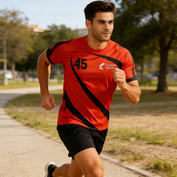 A sporty red and black crew neck raglan t-shirt featuring a logo, worn by a man running outdoors.