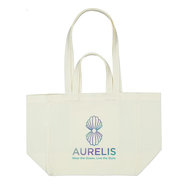 A light cream canvas bag with a colourful logo in the centre and two sturdy handles.