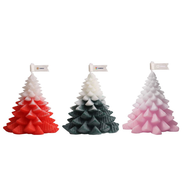Christmas tree-shaped candles in red, green, and pink colours, featuring a small flag on top of each.