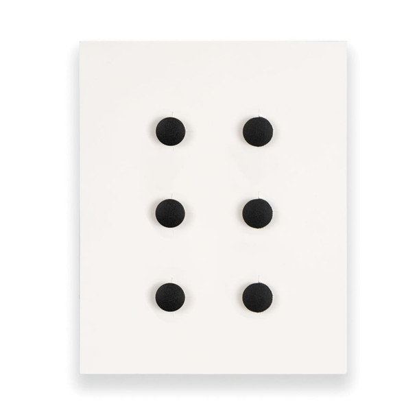 A display of six black custom shoe charms arranged on a white background. The display includes a branding logo.