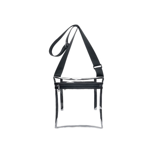 A clear PVC crossbody bag with a black strap and an inner pouch, featuring a zippered compartment.
