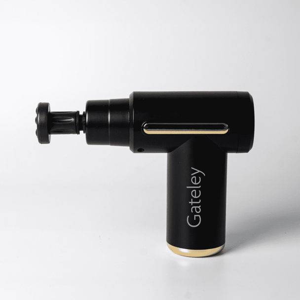 A black massage gun with gold accents and a branding logo, featuring an adjustable head for targeted relief.
