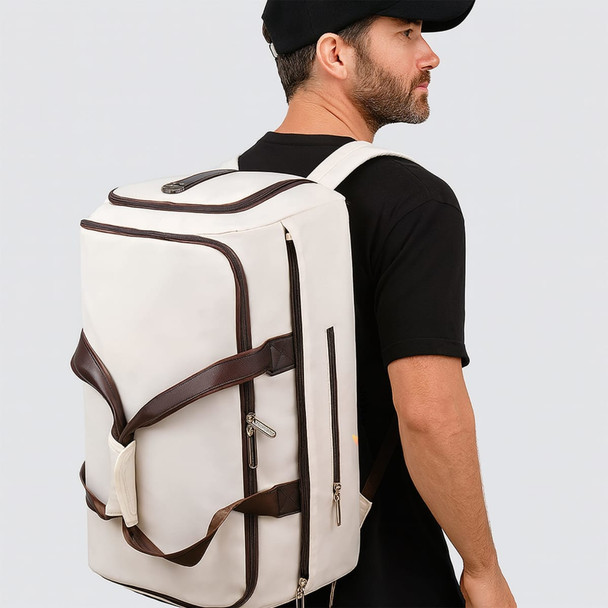 A white convertible backpack duffel garment bag with brown straps, displayed on a person wearing a black cap and shirt.